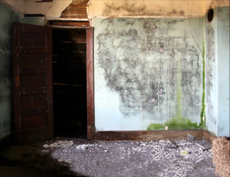 a fire and flood damaged home in Stamford during major area flooding