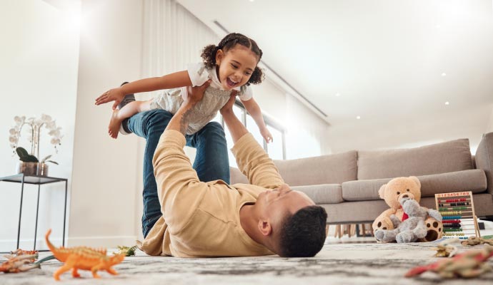 Family playing in a living room