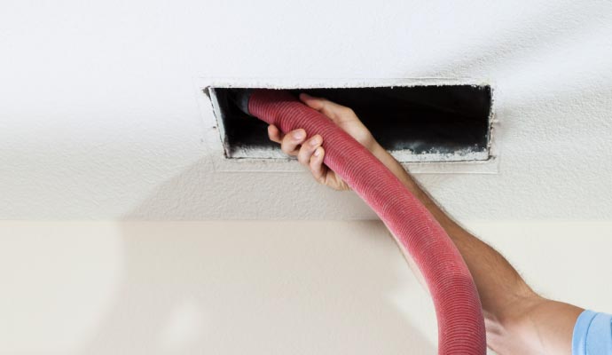 Professional duct cleaning with equipment