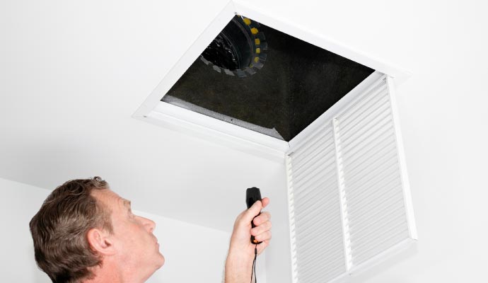 Professional inspecting air duct