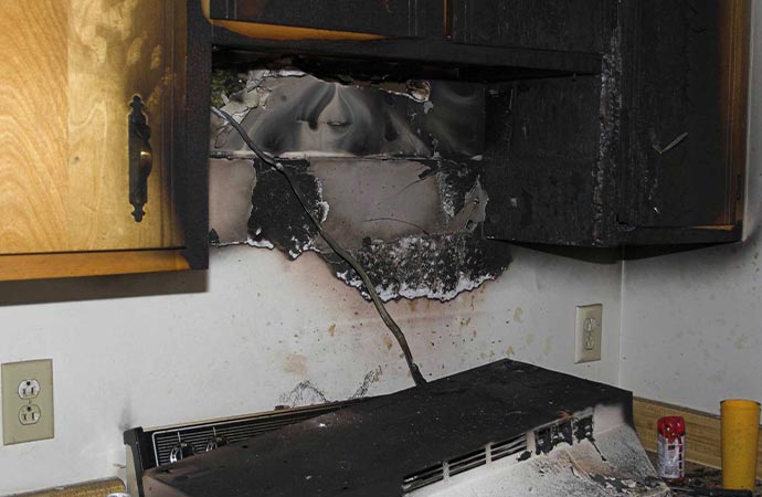 kitchen burn wall cabinet inside fire damage house