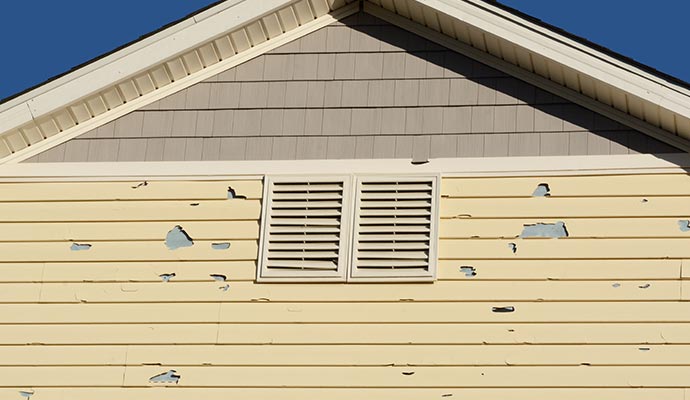 hail damage house wall