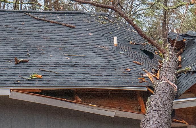 Storm roof damaged house